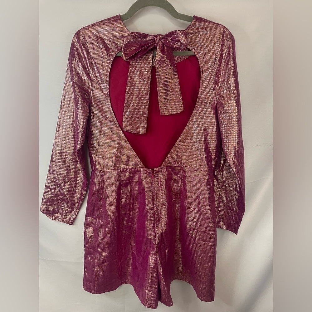 asos fuchsia romper with an open back. So shiny and festive! This is lined.